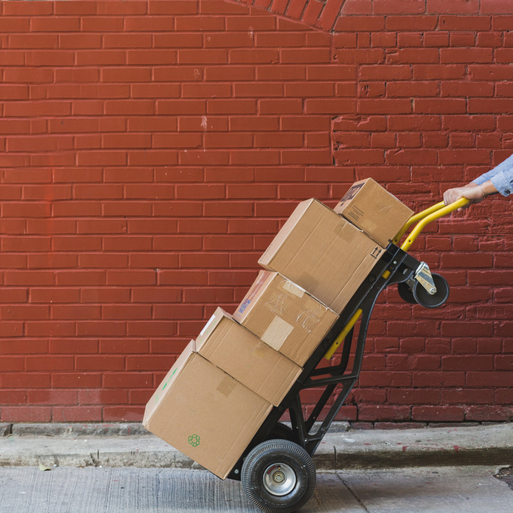 shipping-boxes-in-front-of-red-brick.jpg